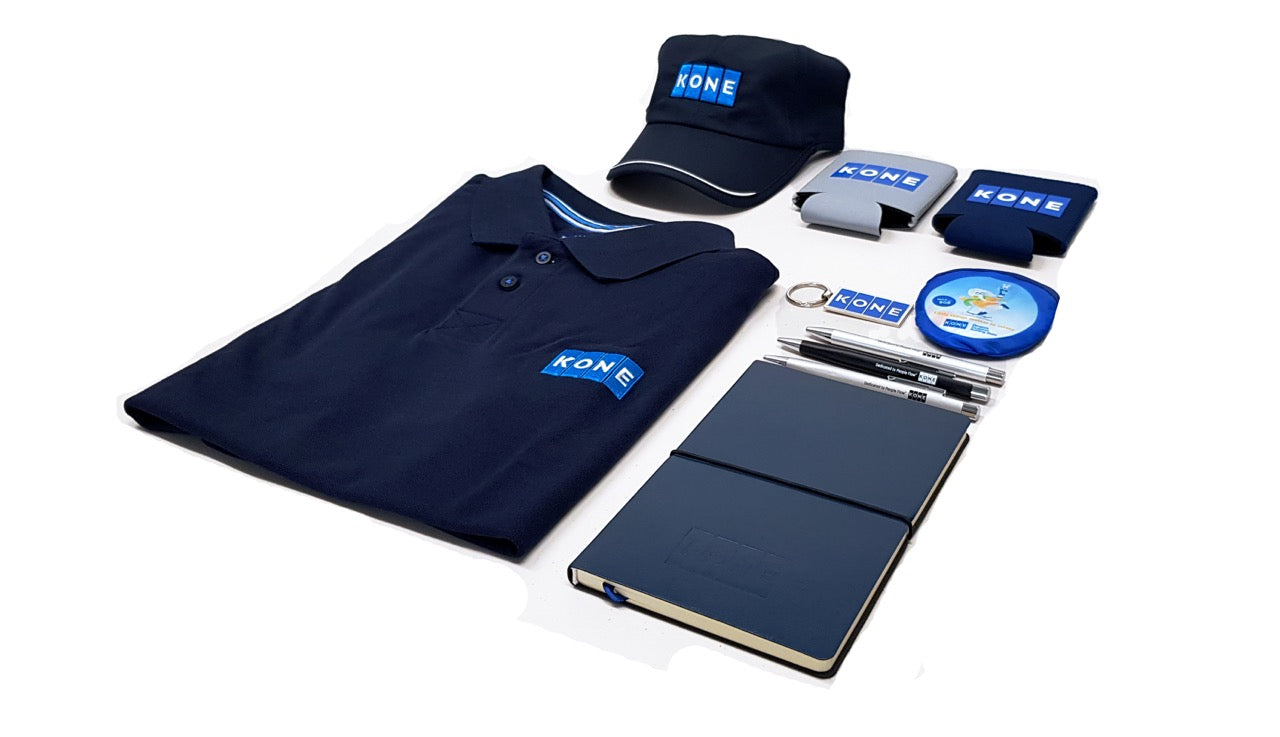 Promotional items and branded corporate gifts produced for Kone by Marketiers, including promotional t shirts, branded caps, personalised keyrings, stubby holder printing and company branded notebooks.